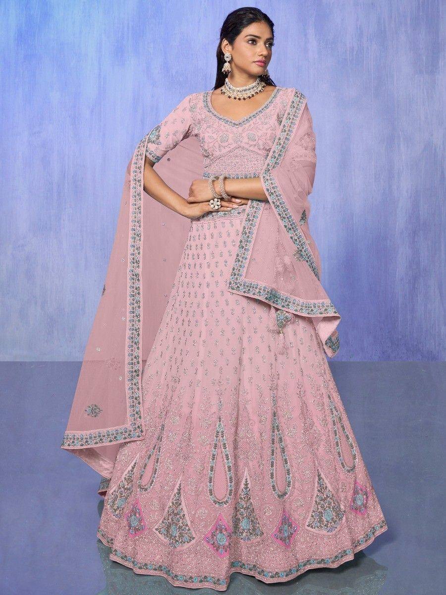 Pink embroidered lehenga choli with dupatta, perfect for Indian weddings and festive occasions