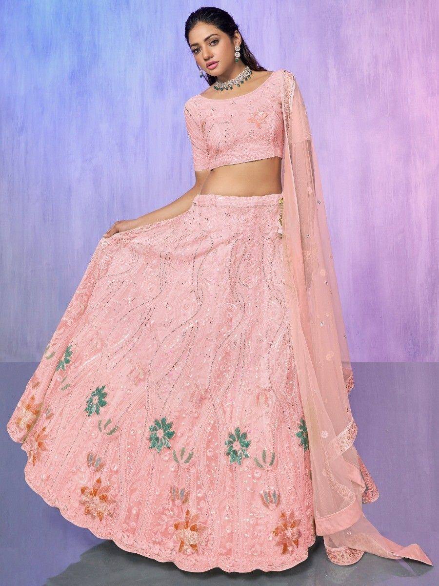 Pink embroidered lehenga choli with floral motifs and sheer dupatta, perfect for Indian ethnic occasions