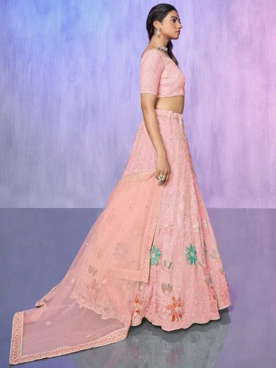 Pink floral embroidered lehenga choli with sheer dupatta, perfect for Indian weddings and festive occasions