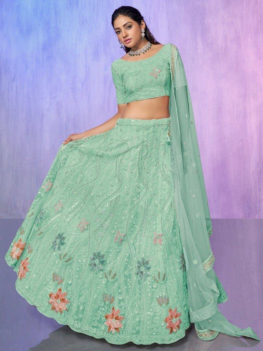 Mint green designer lehenga choli with floral embroidery and sequins, perfect for Indian ethnic occasions