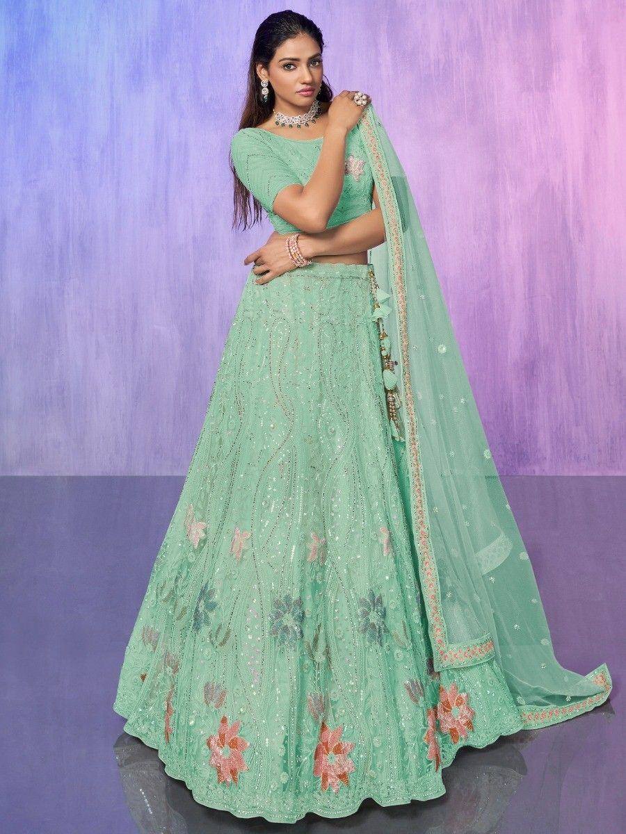 Mint green designer lehenga choli with floral embroidery and sequins, perfect for Indian ethnic wear occasions