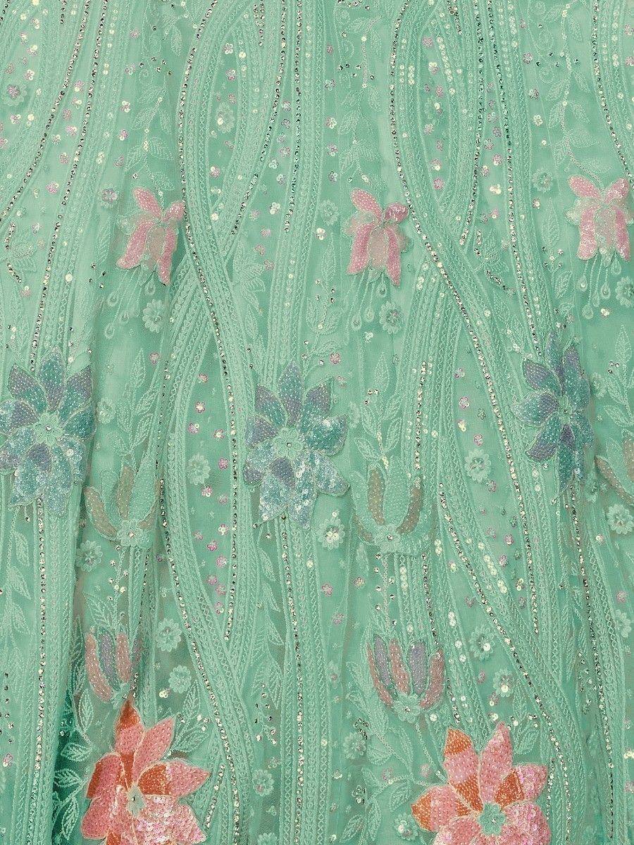Mint green ethnic gown with floral sequin embroidery and delicate lace detailing