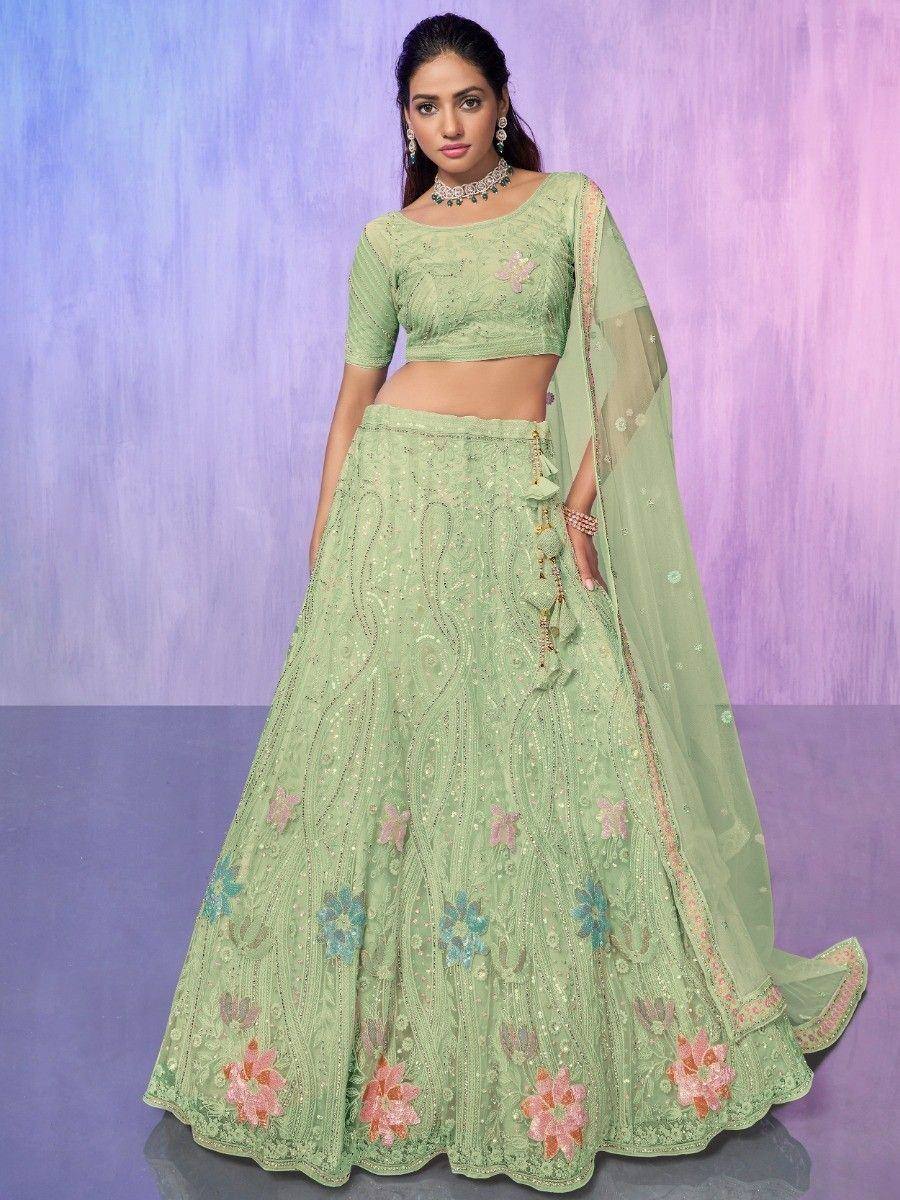 Mint green embroidered lehenga choli with floral motifs and sheer dupatta, perfect for Indian ethnic occasions