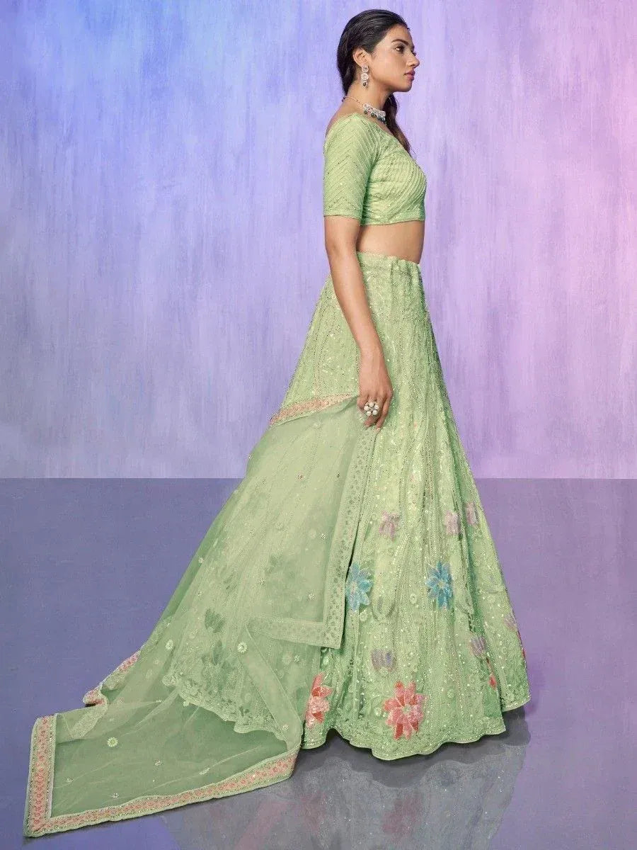 Mint green embroidered lehenga choli with floral motifs and sheer dupatta, perfect for Indian ethnic wear occasions