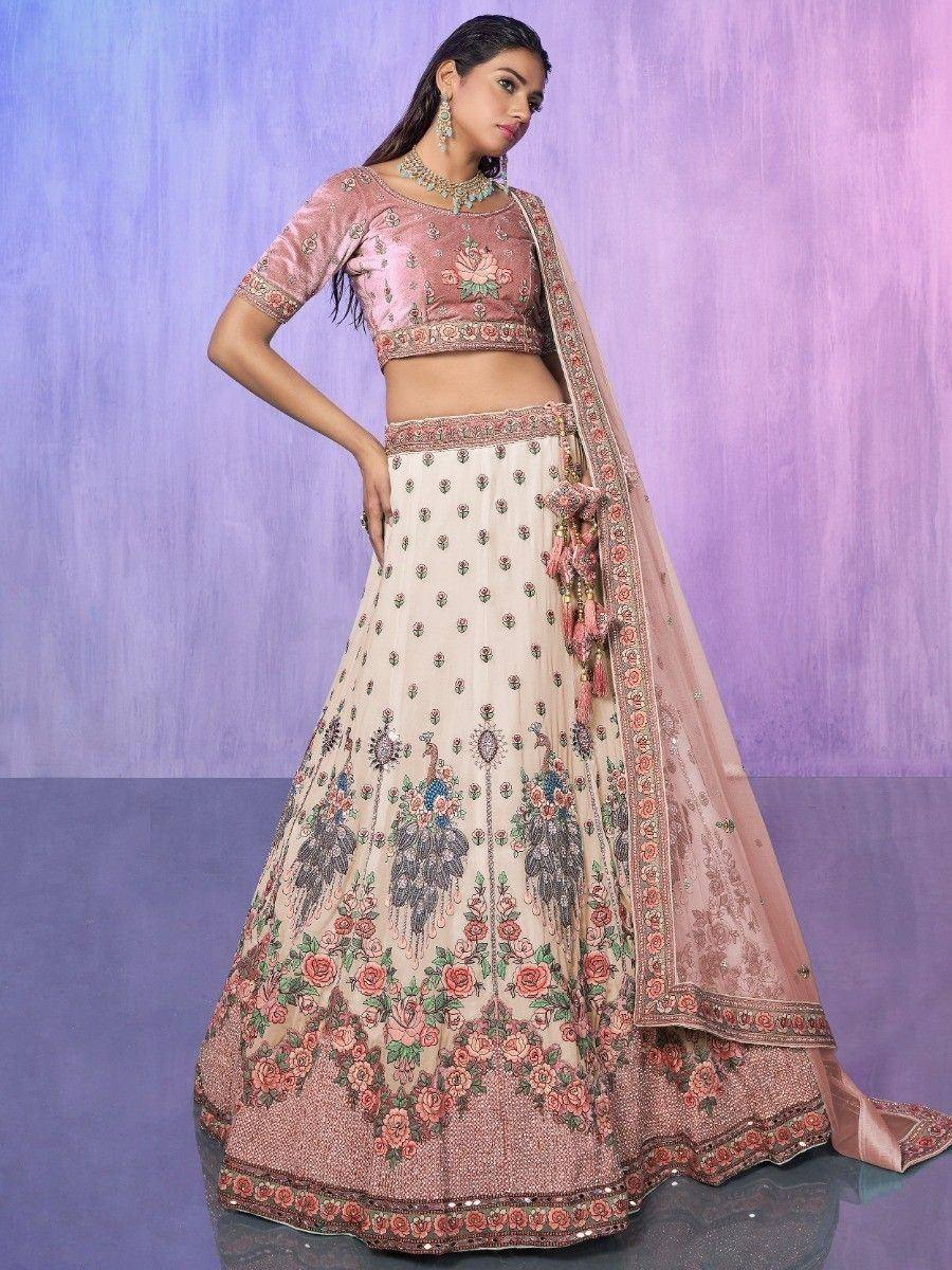 Pink and cream floral lehenga choli with peacock embroidery, perfect for Indian weddings and festive occasions