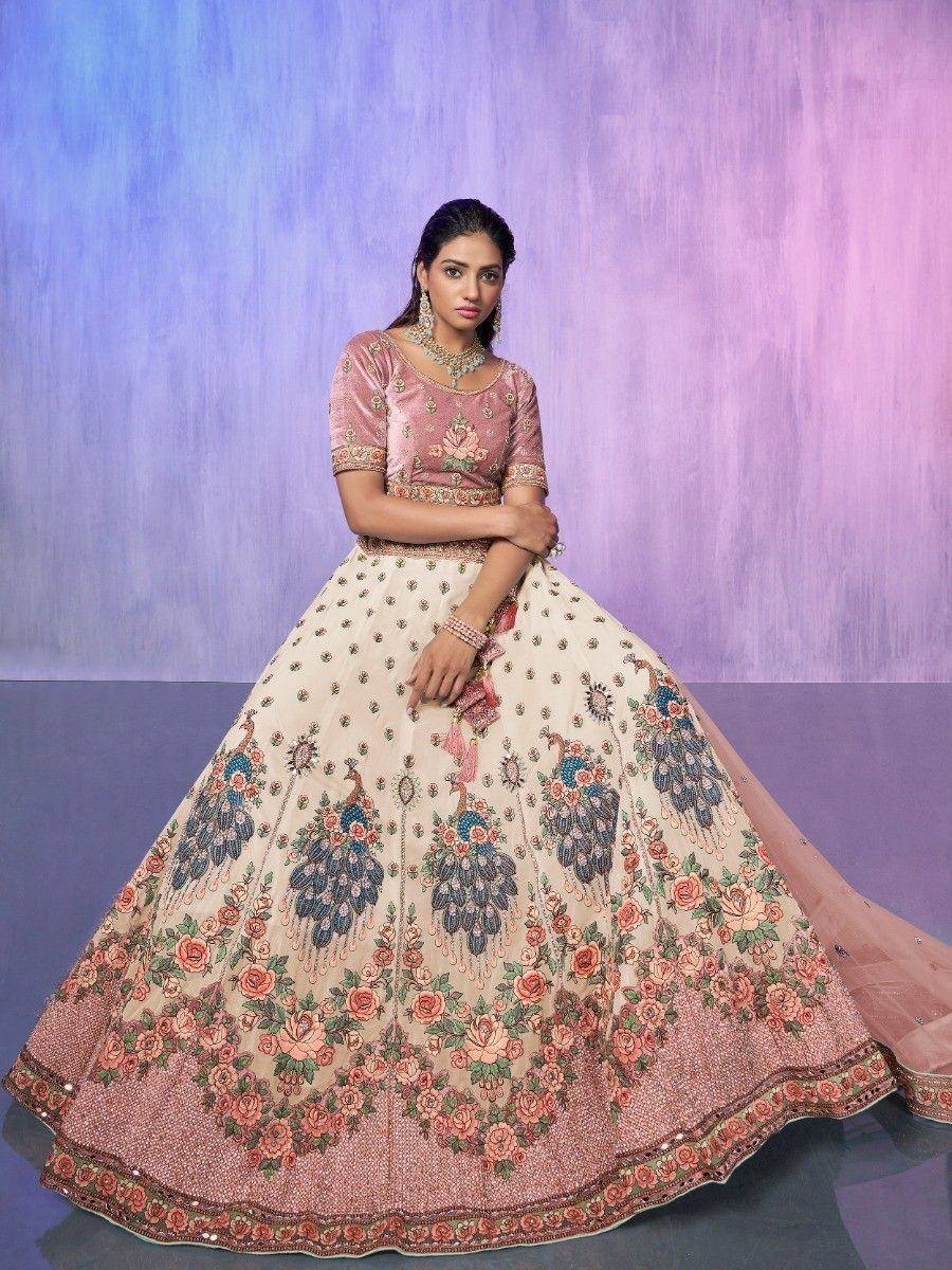 Elegant Indian lehenga choli with peacock and floral embroidery, perfect for weddings and festive occasions