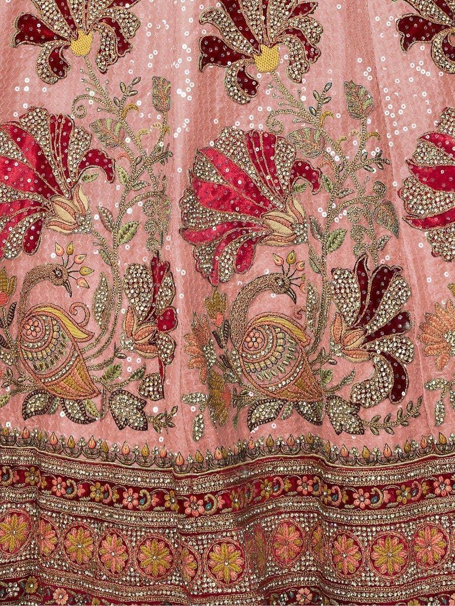 Pink lehenga with peacock and floral embroidery, sequins, and detailed border for ethnic wear