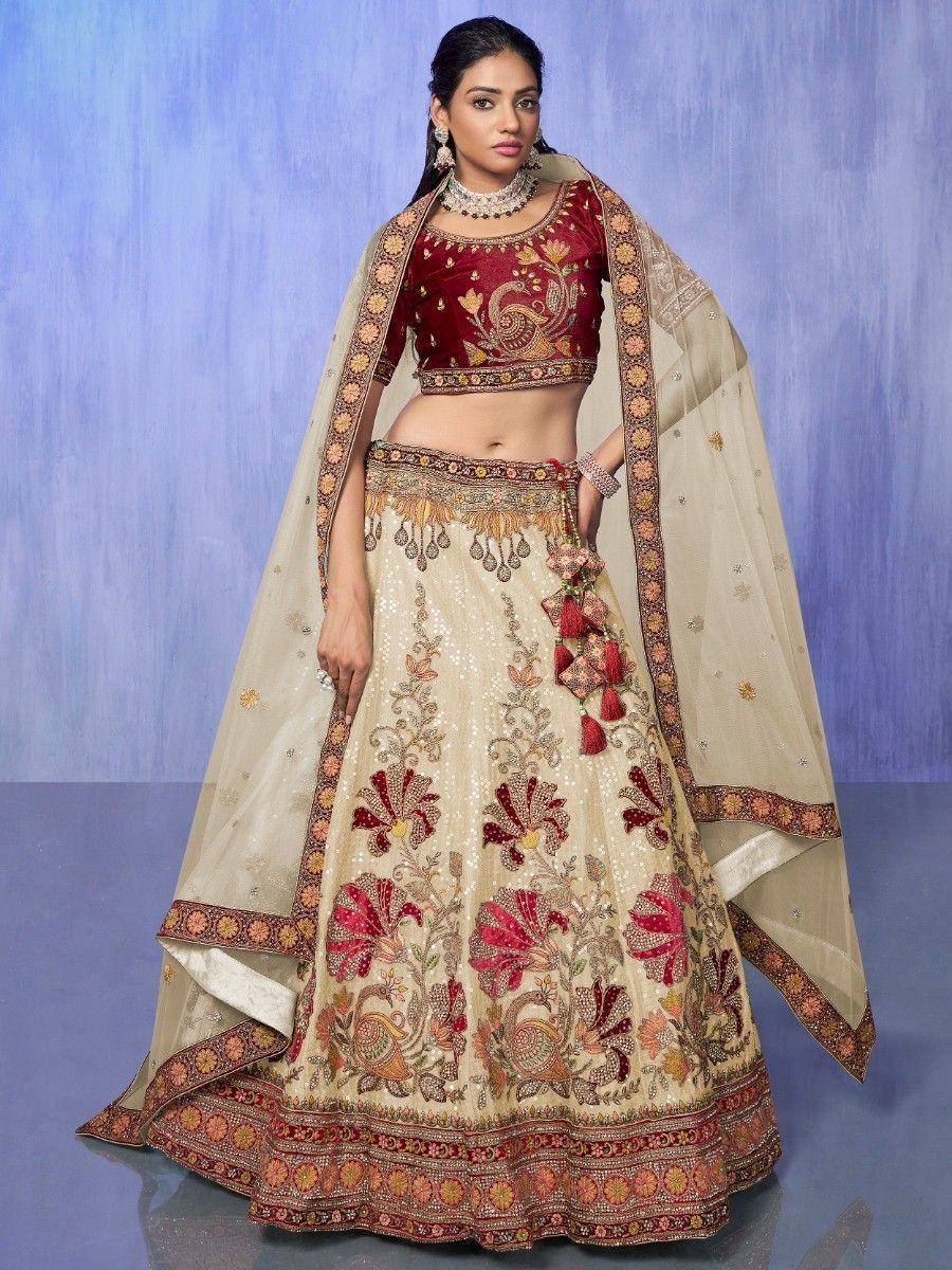 Designer lehenga choli with floral embroidery, maroon blouse, and dupatta for Indian ethnic wear