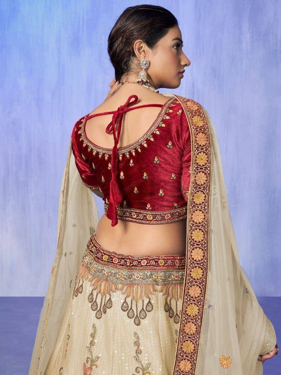 Red velvet designer lehenga choli with back tie and floral embroidery, paired with beige dupatta