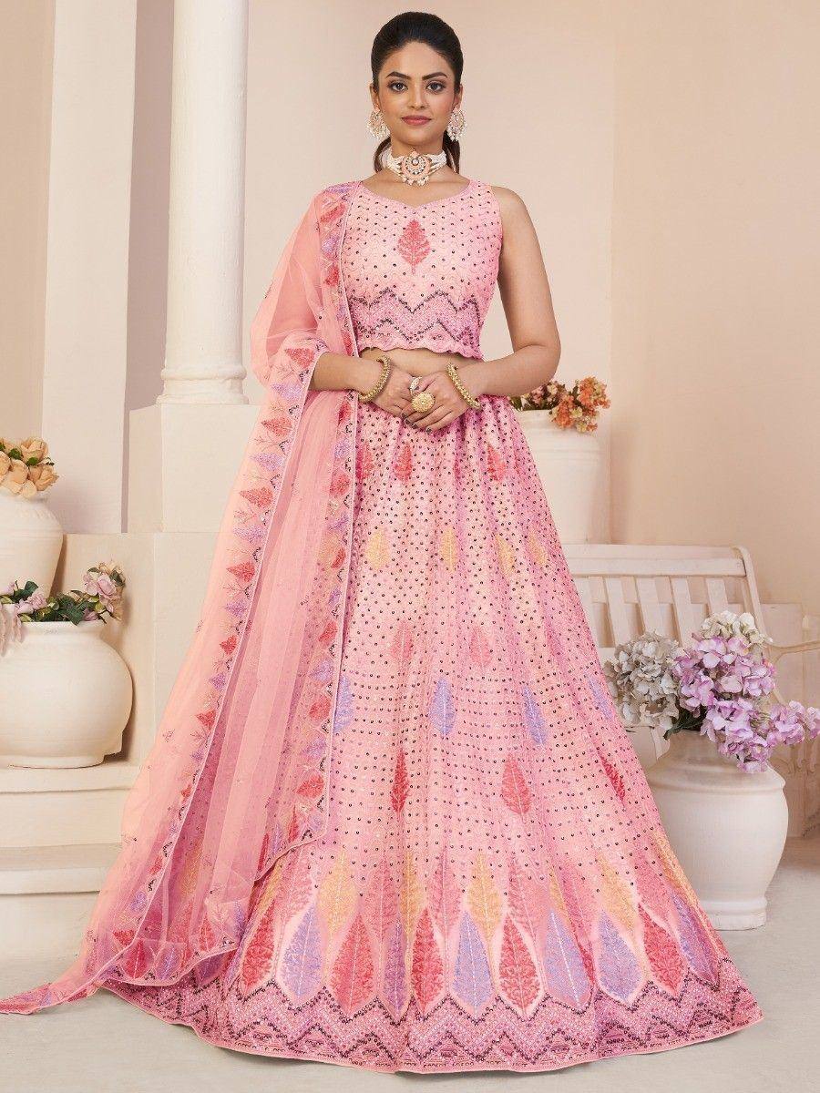 Pink designer lehenga choli with floral embroidery and net dupatta, perfect for weddings and festive occasions