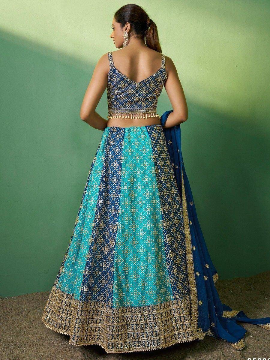 Blue and teal designer lehenga choli with gold embroidery, perfect for Indian ethnic wear occasions