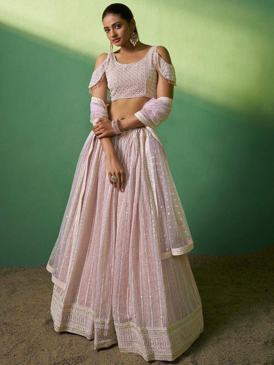 Pink embroidered lehenga choli with cold shoulder blouse and sheer dupatta, perfect for Indian weddings and festive occasions