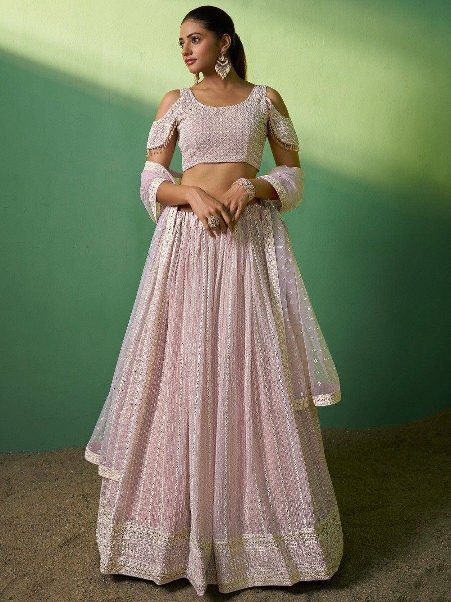 Pink embroidered lehenga choli with cold shoulder top and dupatta, perfect for Indian ethnic occasions.