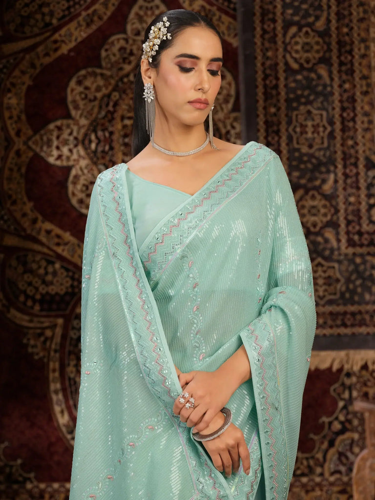 Delightful Firozi Sequins Georgette Reception Wear Saree With Blouse
