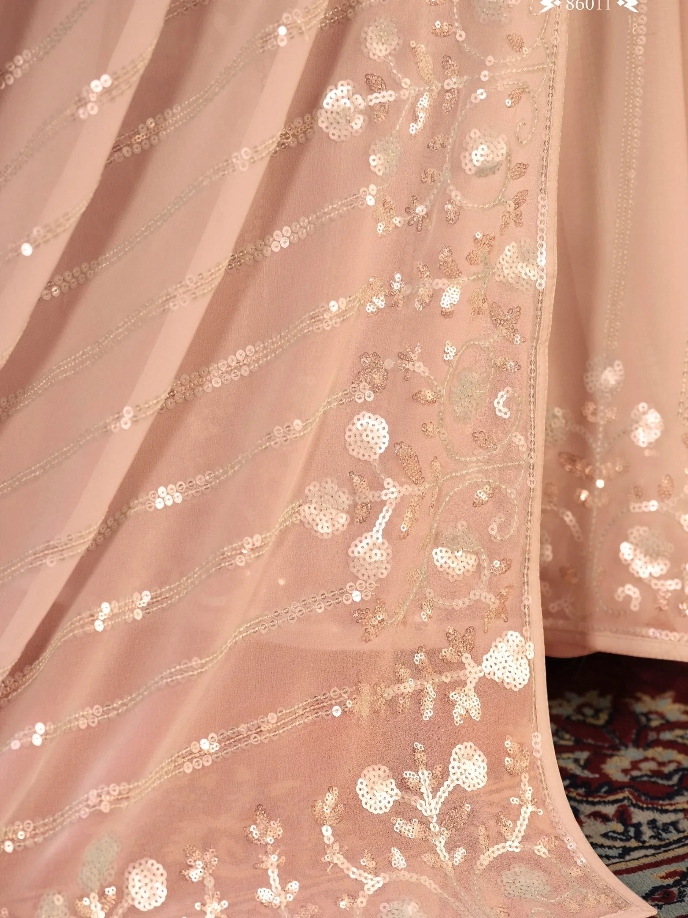 Fascinating Peach Sequins Georgette Party Wear Saree With Blouse