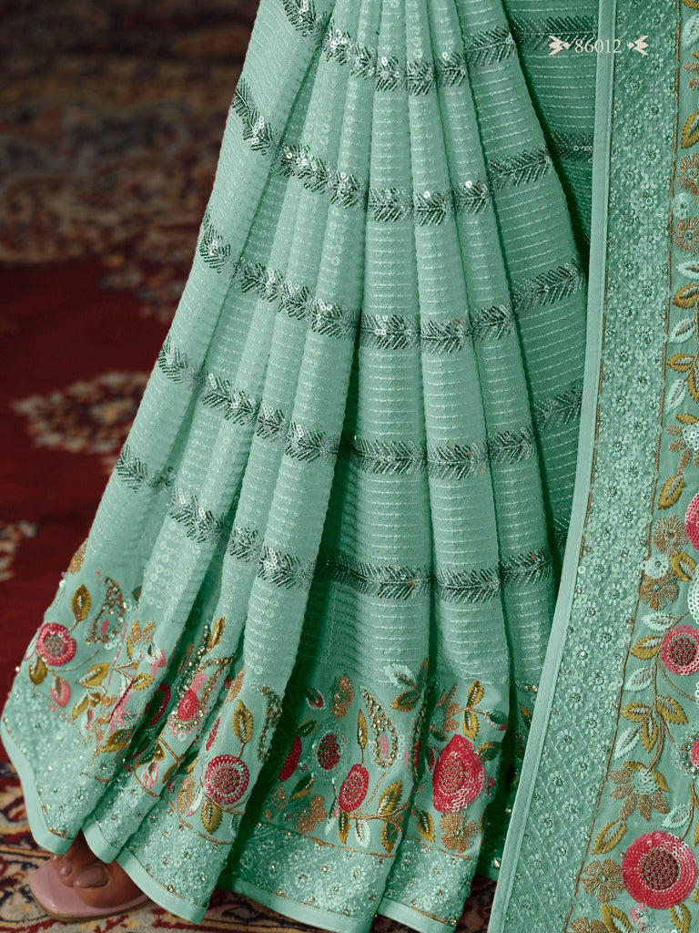 Glamorous Firozi Sequins Georgette Designer Saree With Blouse