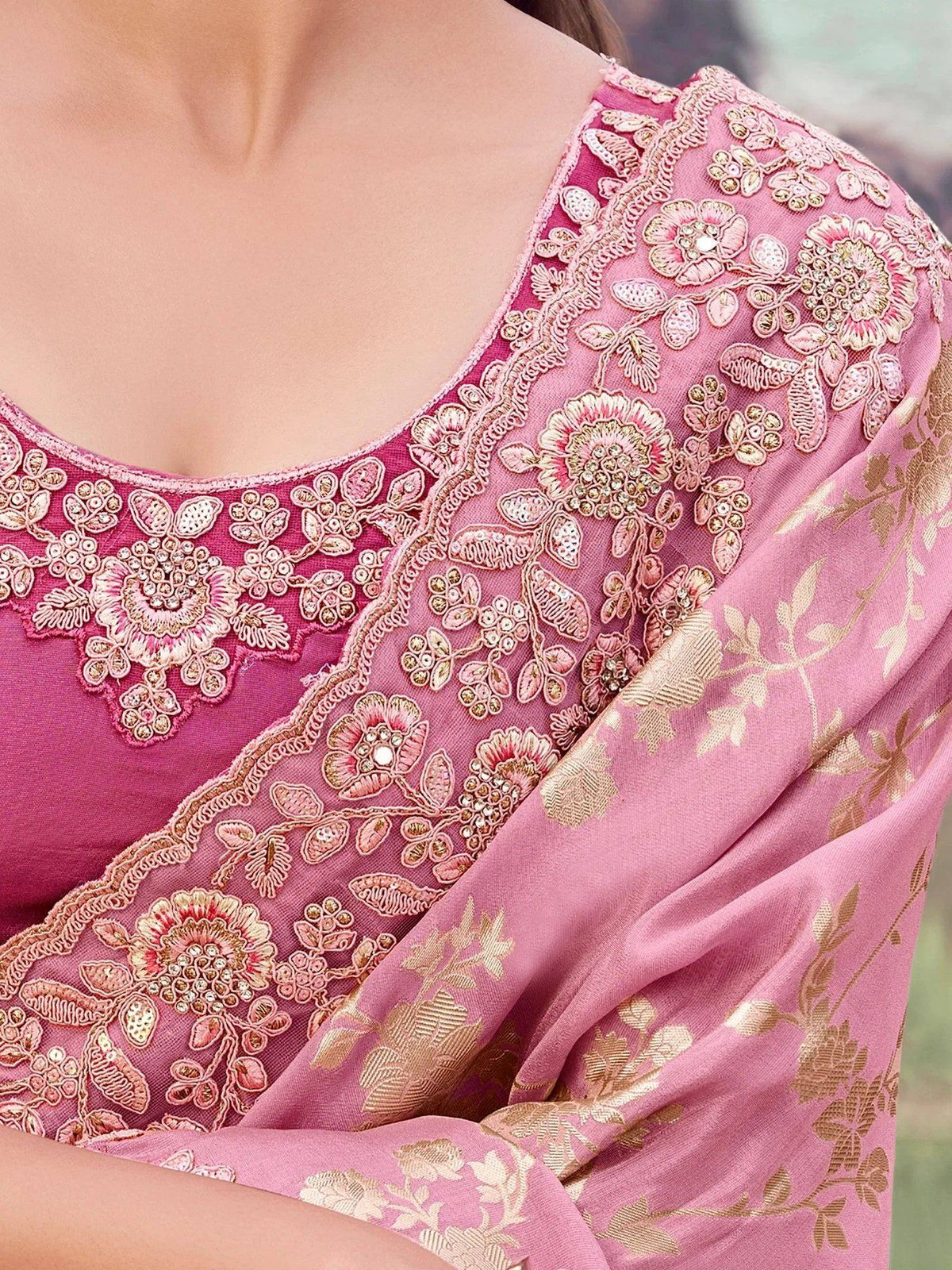 Pink ethnic saree with gold floral embroidery and embellished blouse