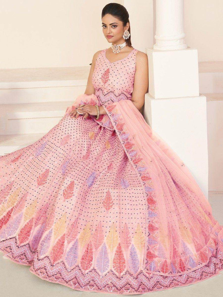 Astonishing Pink Sequins Net Engagement Wear Lehenga Choli