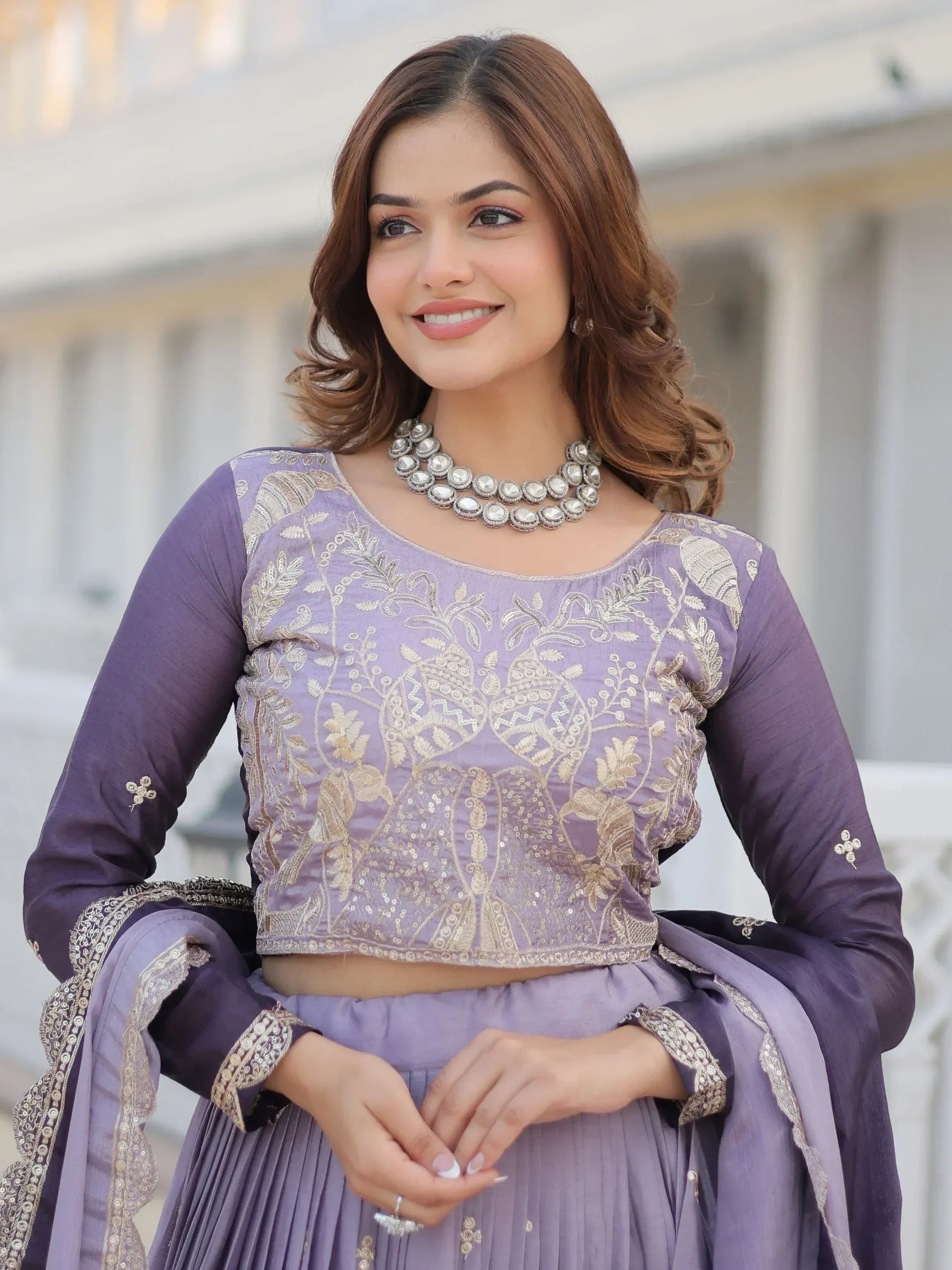 Lavender embroidered lehenga choli with gold detailing, perfect for Indian ethnic wear and festive occasions.