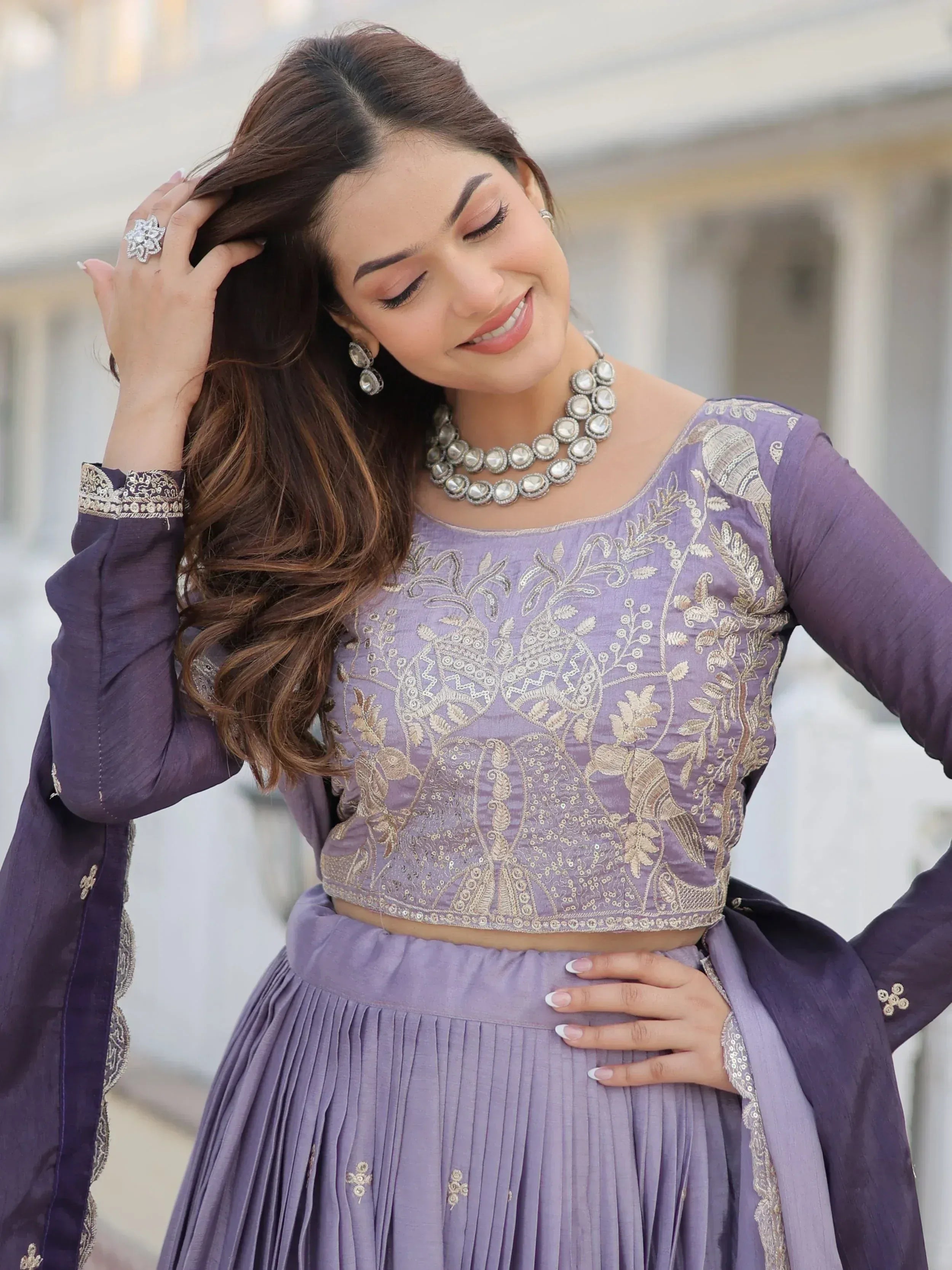 Purple embroidered lehenga choli with gold detailing, perfect for Indian ethnic wear events