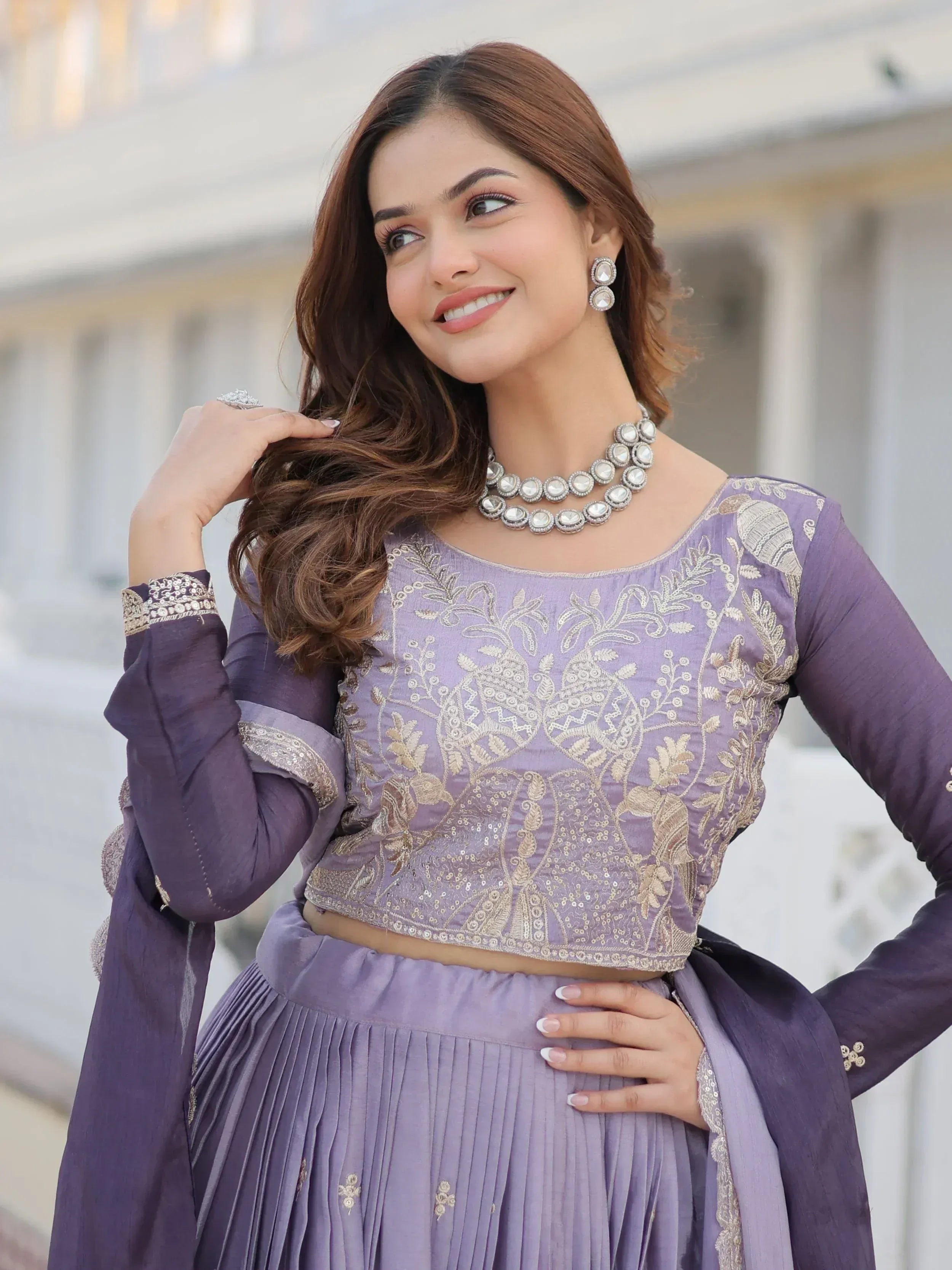 Purple embroidered lehenga choli with gold detailing, perfect for Indian ethnic wear occasions