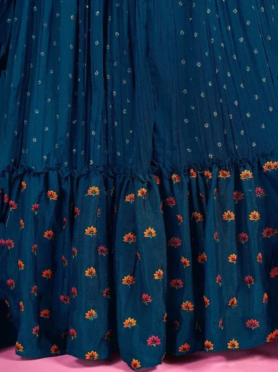 Teal ethnic gown with floral print and pleated skirt, perfect for Indian occasions