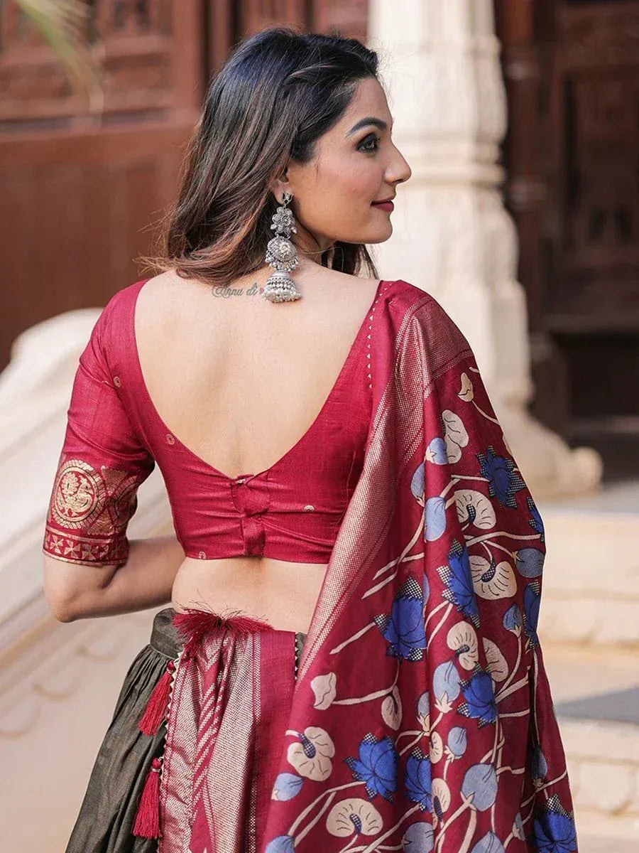Woman in red floral lehenga choli with backless blouse and ethnic jewelry