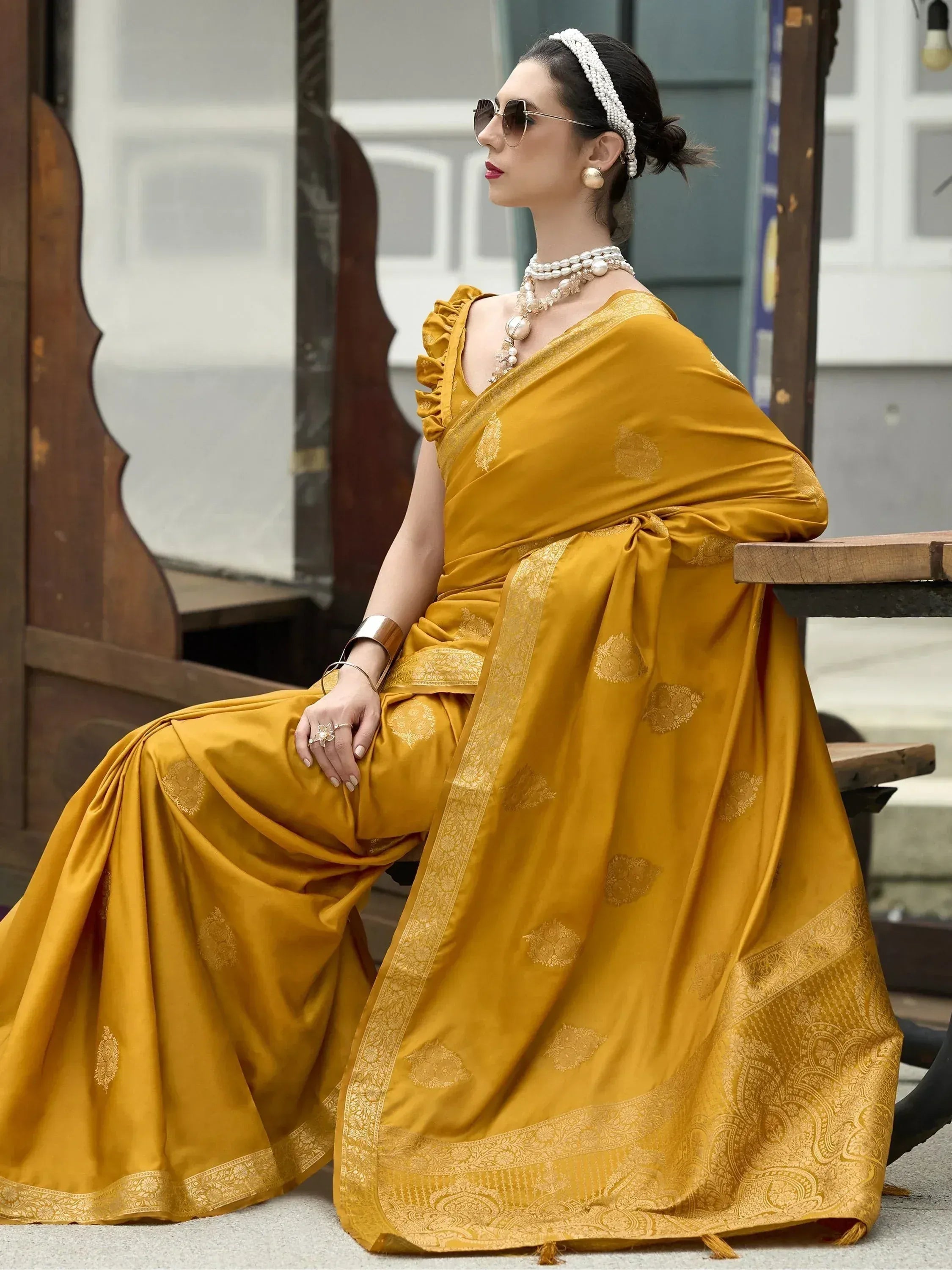 Mustard yellow designer saree with gold embroidery, perfect for ethnic wear and festive occasions.