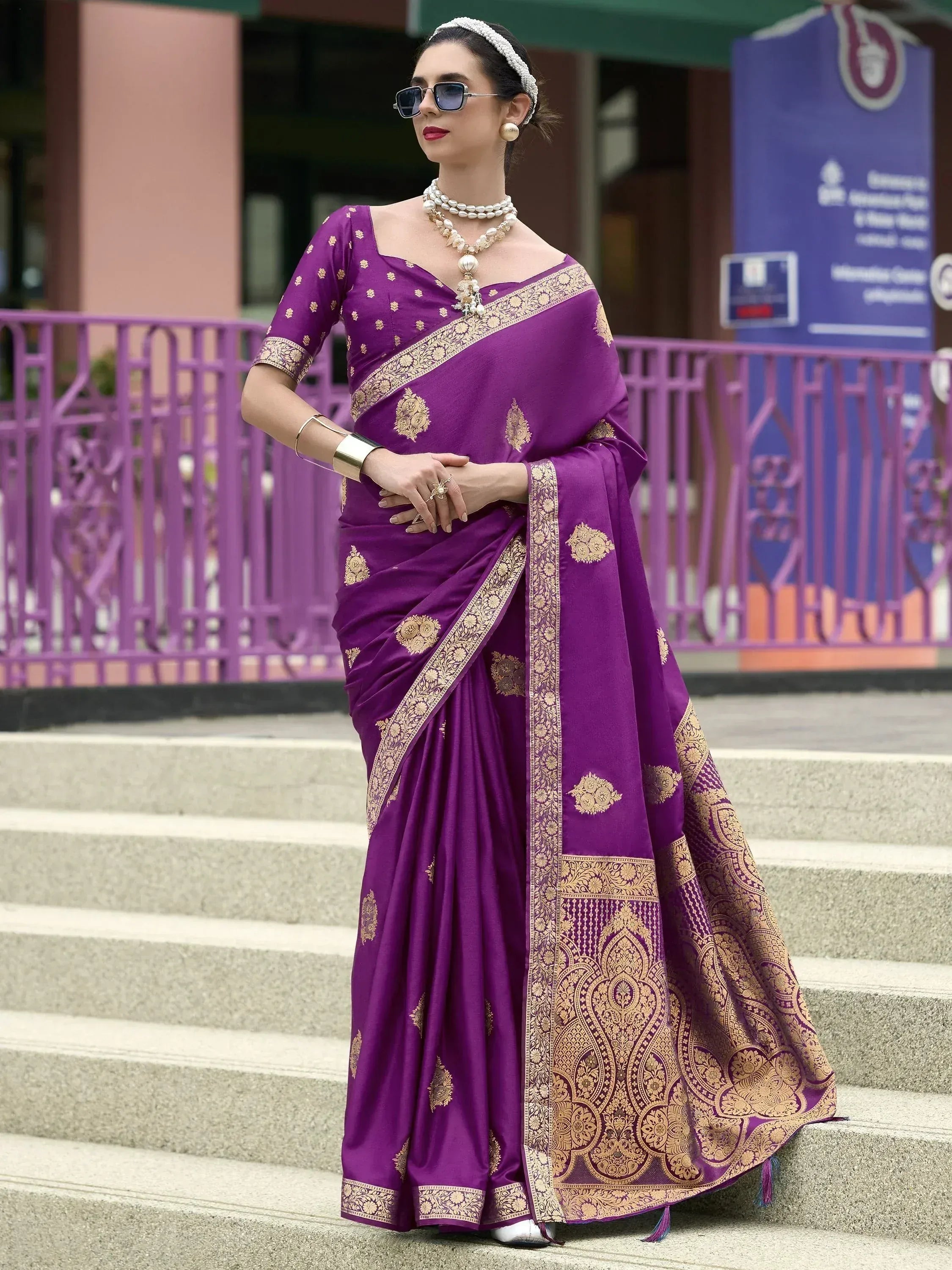 Purple designer saree with gold embroidery, perfect for Indian ethnic wear and festive occasions.