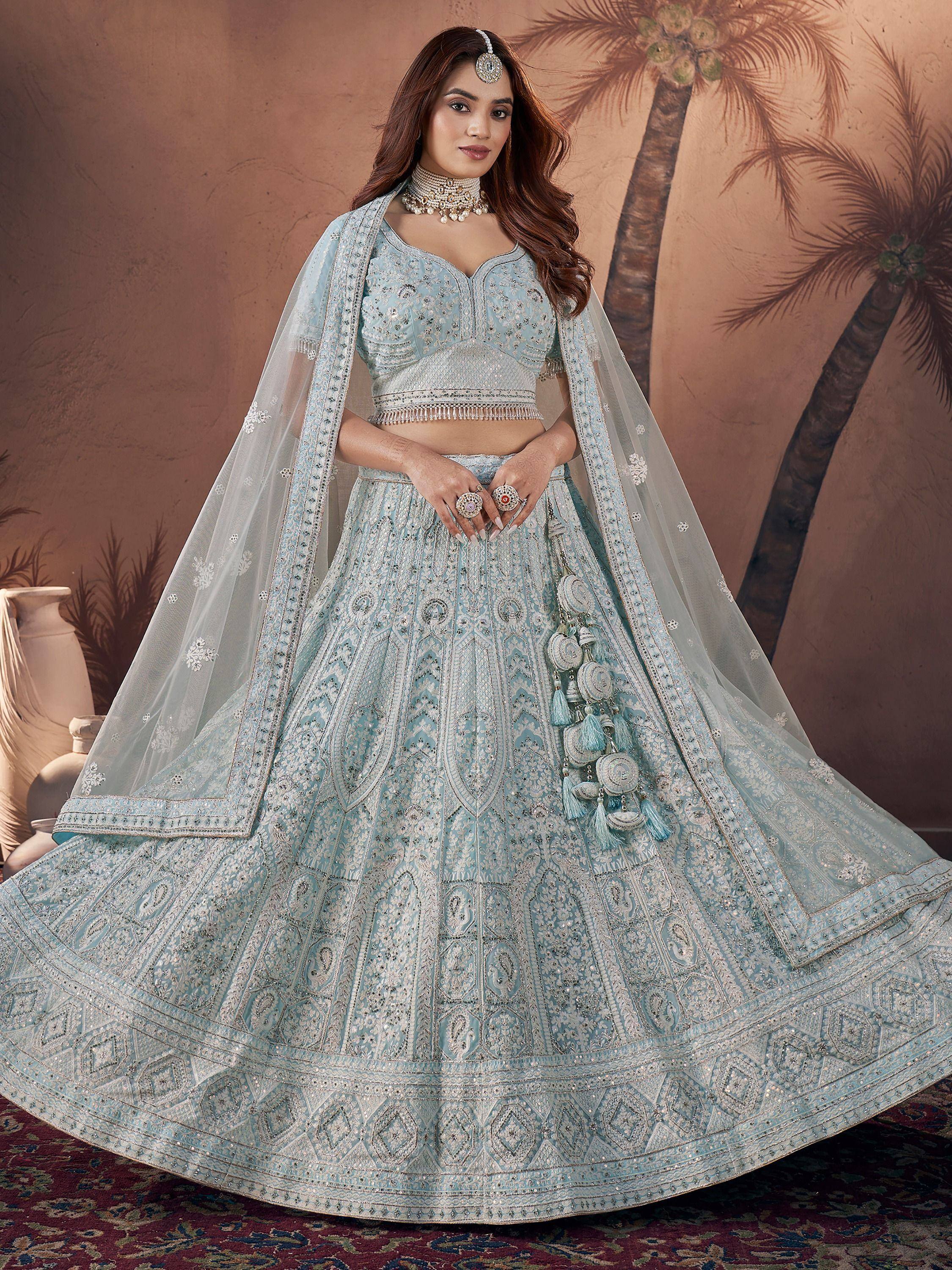 Light blue embroidered lehenga choli with dupatta, perfect for Indian weddings and festive occasions.