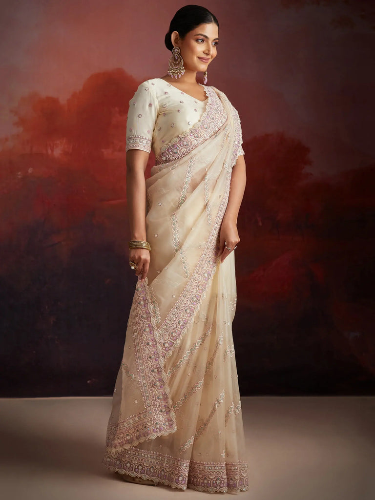 Glamorous Off-White Embroidered Net Traditional Saree With Blouse