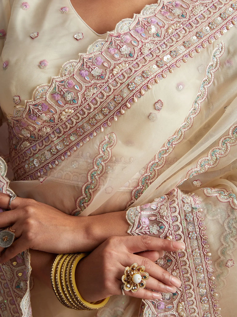 Glamorous Off-White Embroidered Net Traditional Saree With Blouse