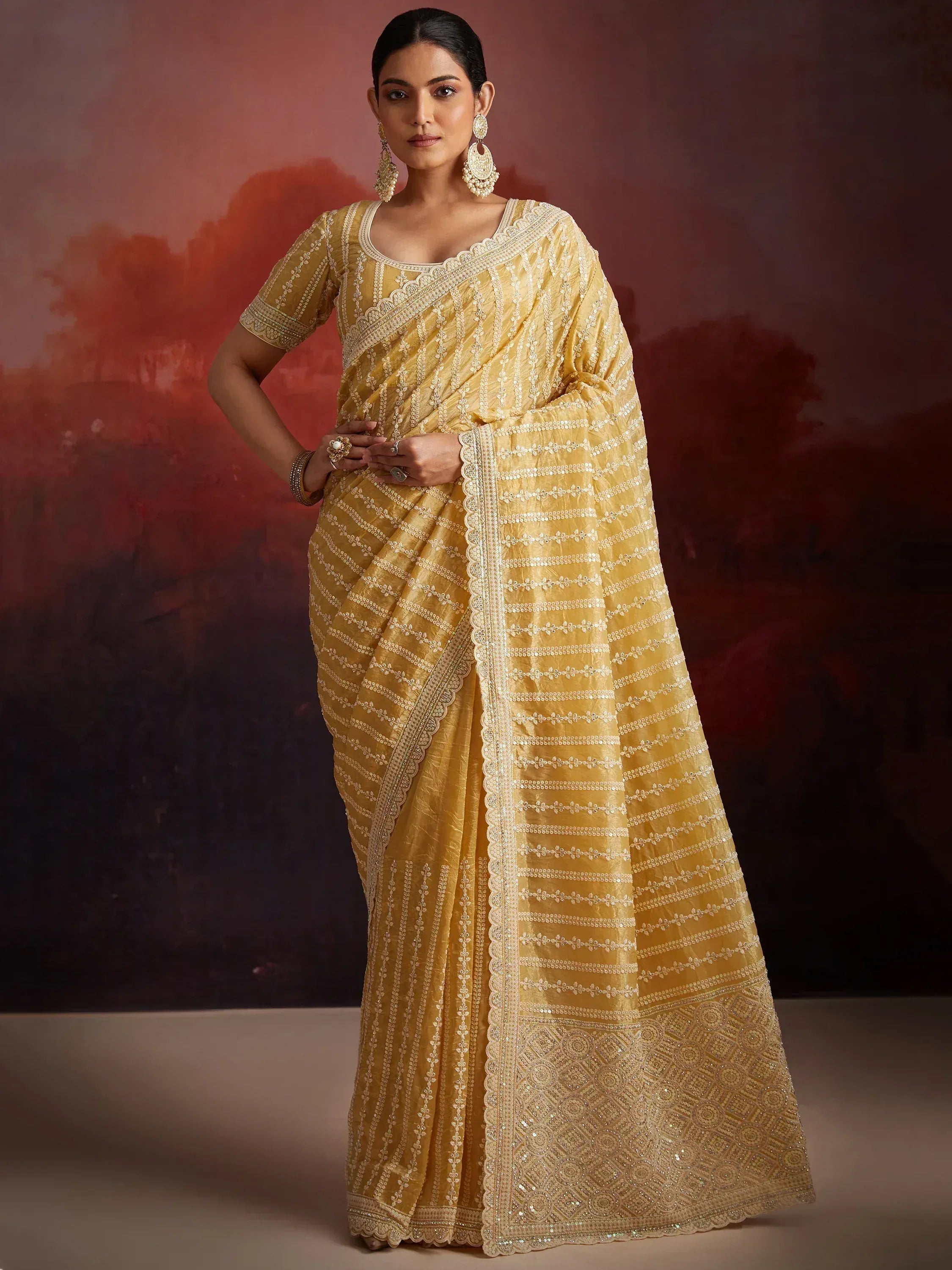 Yellow embroidered saree with sequin work, perfect for Indian ethnic wear and festive occasions.