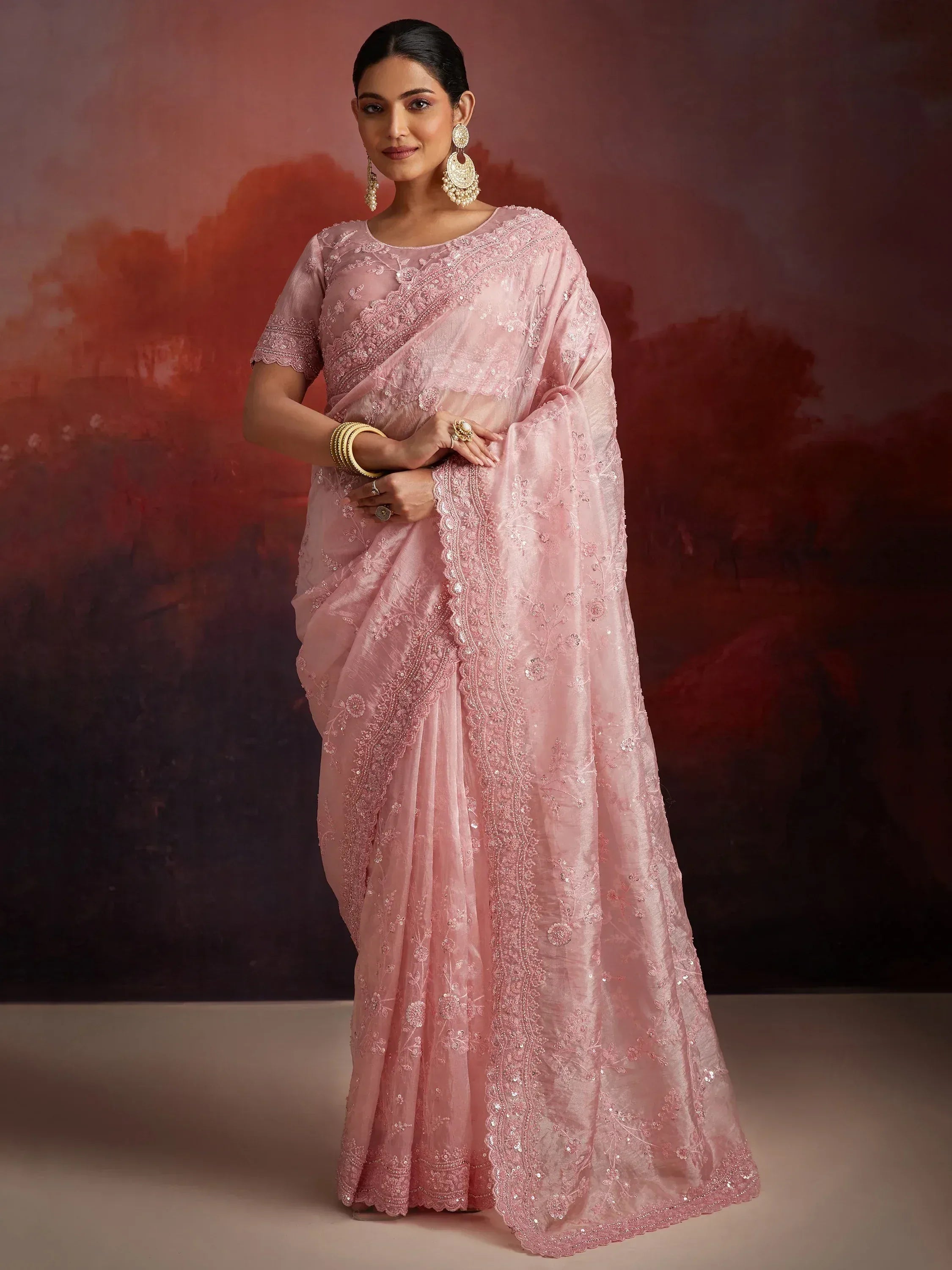 Pink embroidered saree with matching blouse, perfect for Indian ethnic occasions and weddings