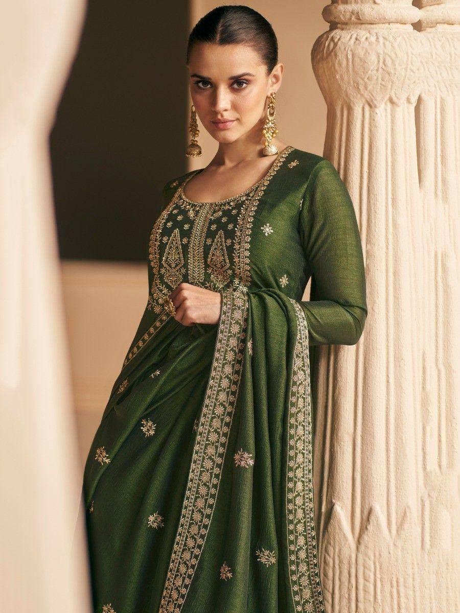 Emerald green embroidered salwar kameez with gold detailing, perfect for Indian ethnic wear occasions