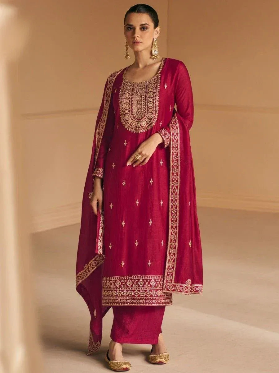 Maroon embroidered salwar kameez with gold detailing, perfect for ethnic occasions and festive wear.