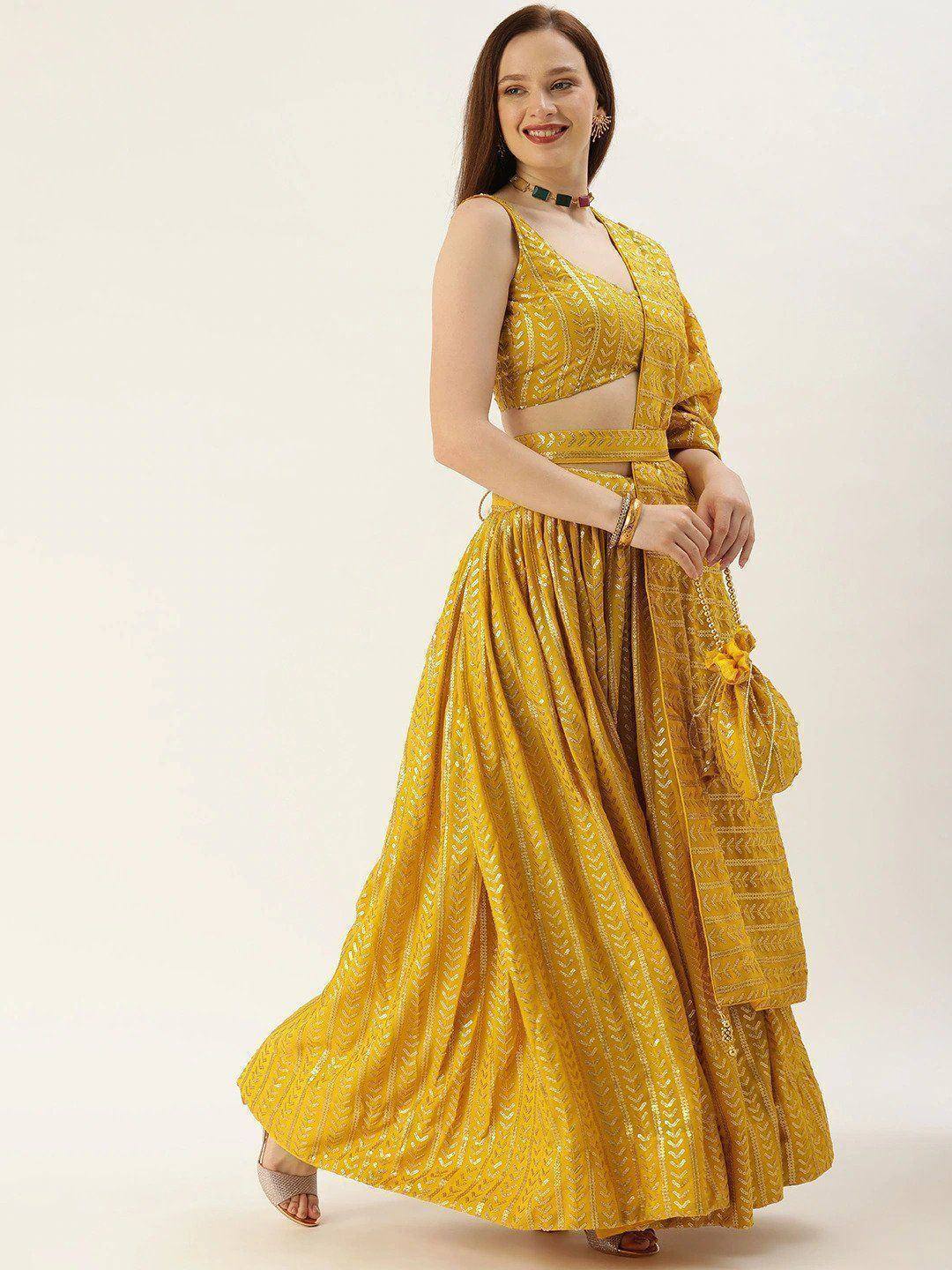 Yellow embroidered lehenga choli with matching dupatta, perfect for Indian ethnic occasions and festive wear.