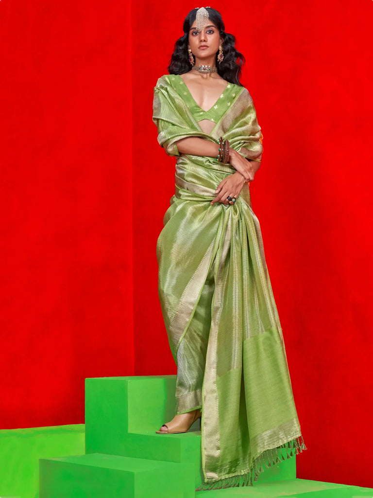 Glamorous Green Zari Weaving Silk Festival Wear Saree With Blouse