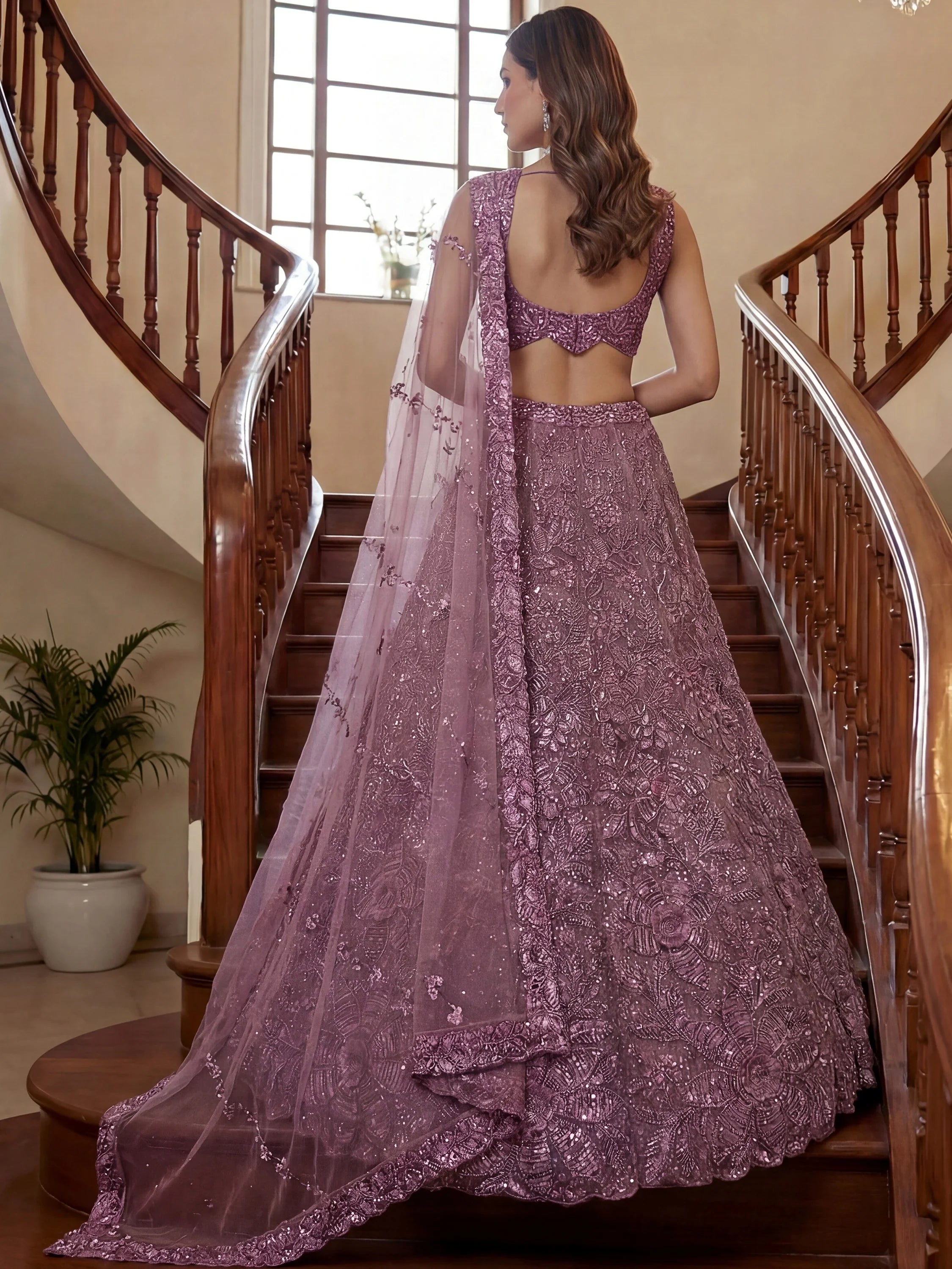 Impressive Purple Sequins Net Reception Wear Lehenga Choli