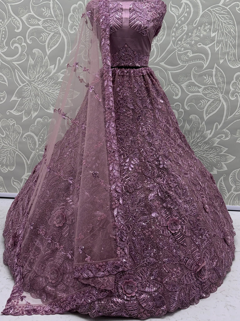 Impressive Purple Sequins Net Reception Wear Lehenga Choli