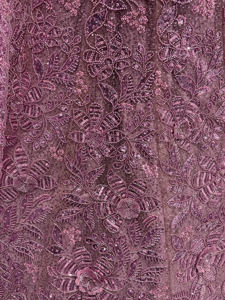 Impressive Purple Sequins Net Reception Wear Lehenga Choli