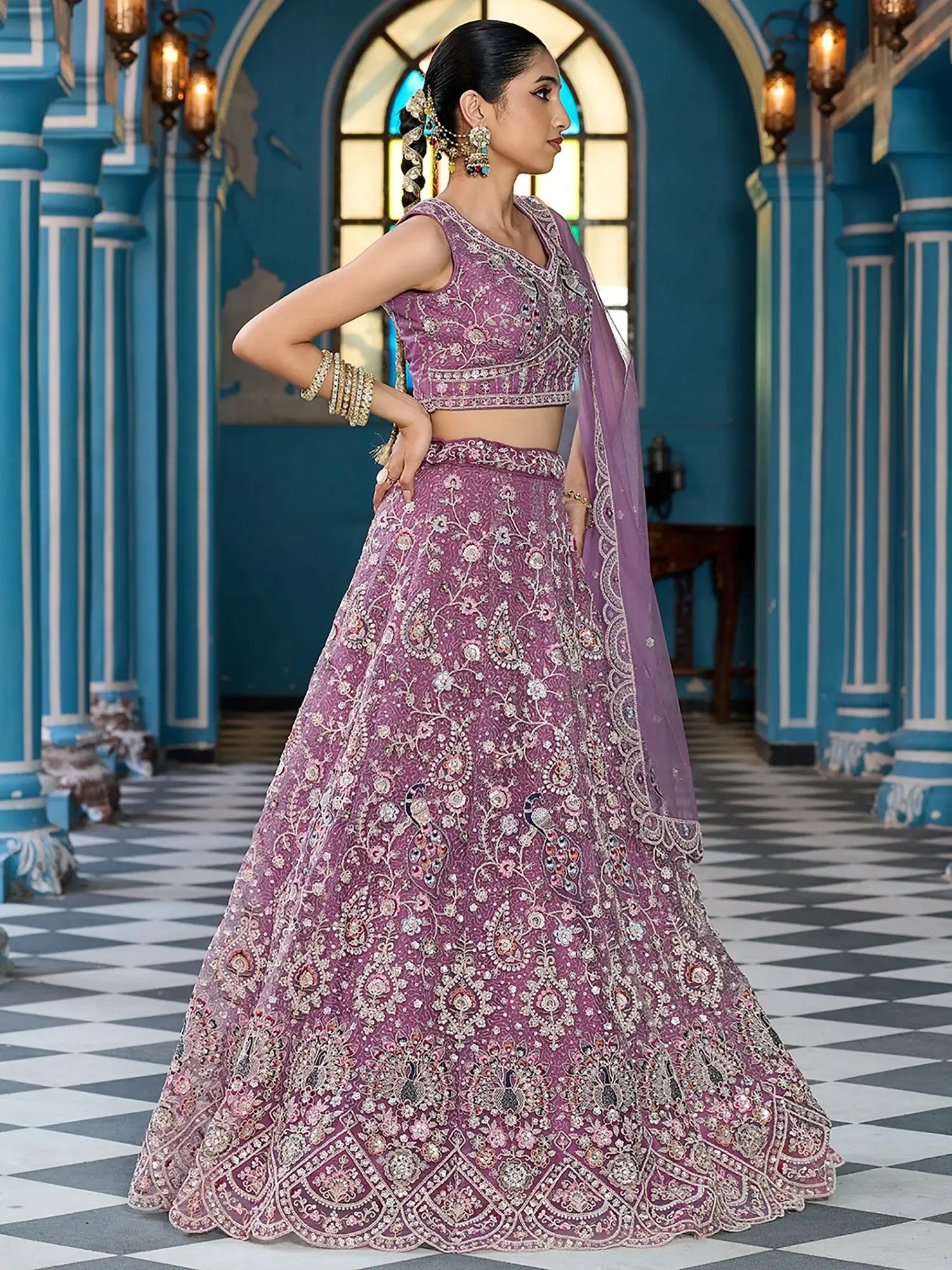 Attractive Lavender Thread Embroidered Net Engagement Lehenga Choli