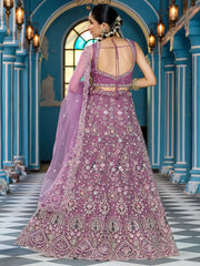 Attractive Lavender Thread Embroidered Net Engagement Lehenga Choli