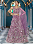 Attractive Lavender Thread Embroidered Net Engagement Lehenga Choli