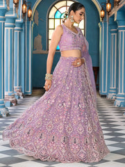 Awesome Purple Sequins Embroidered Net Wedding Lehenga Choli