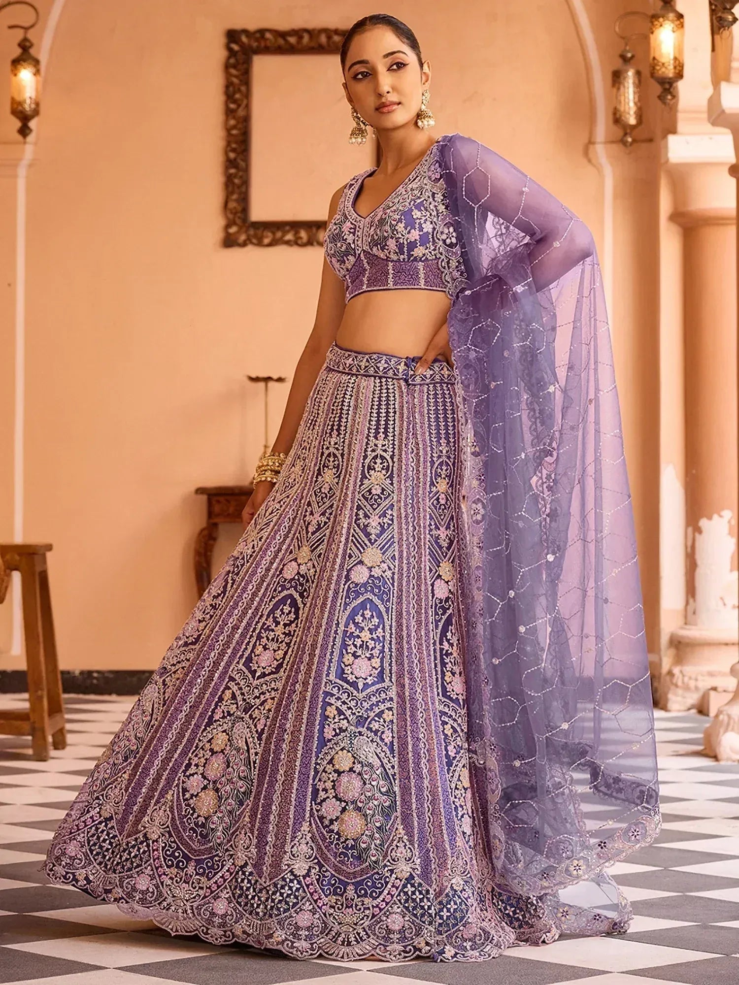 Fabulous Purple Sequins Embroidered Net Wedding Wear Lehenga Choli