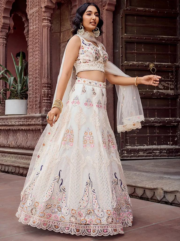 Stunning Cream Sequins Embroidered Net Wedding Wear Lehenga Choli