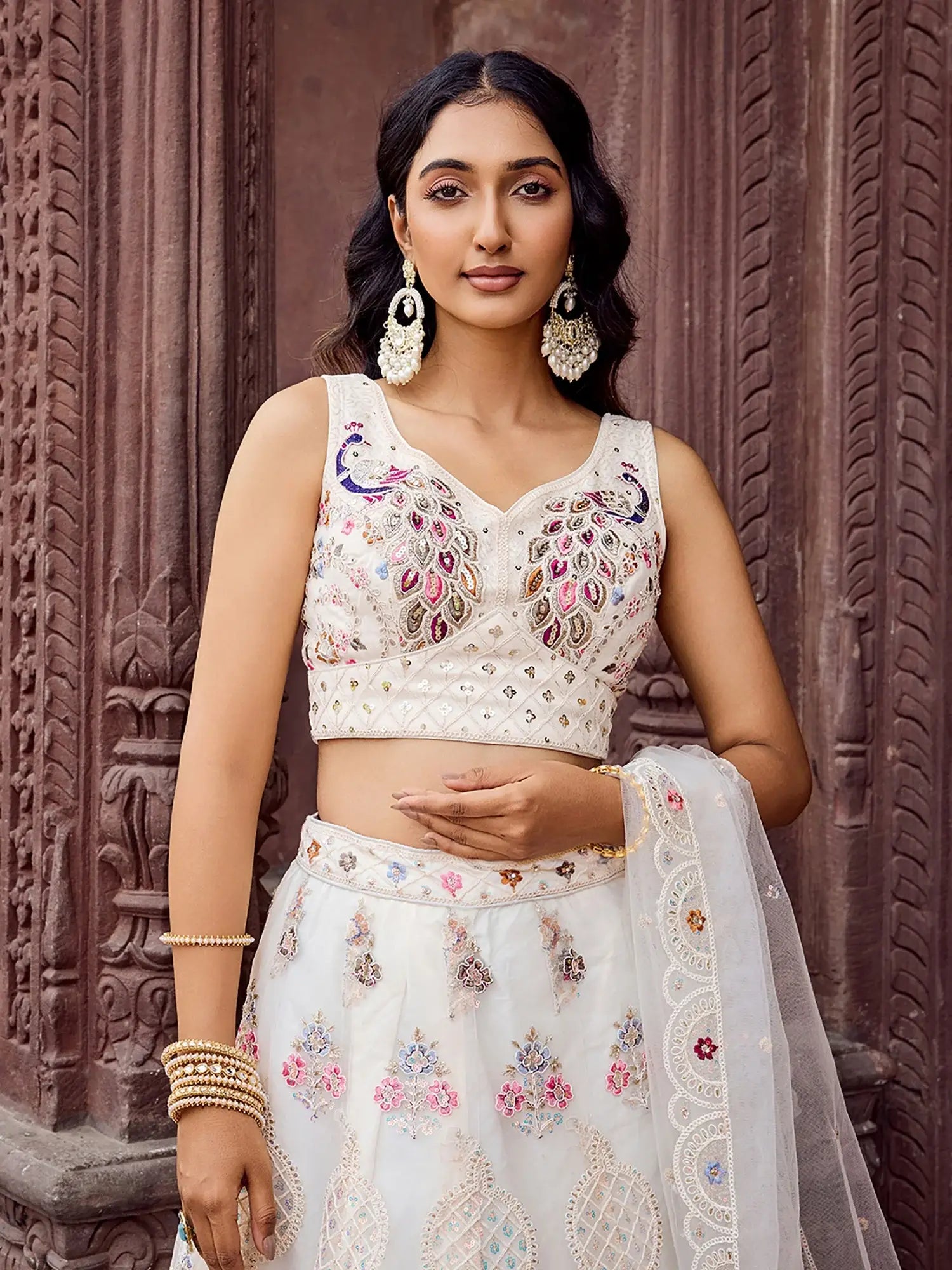 Stunning Cream Sequins Embroidered Net Wedding Wear Lehenga Choli