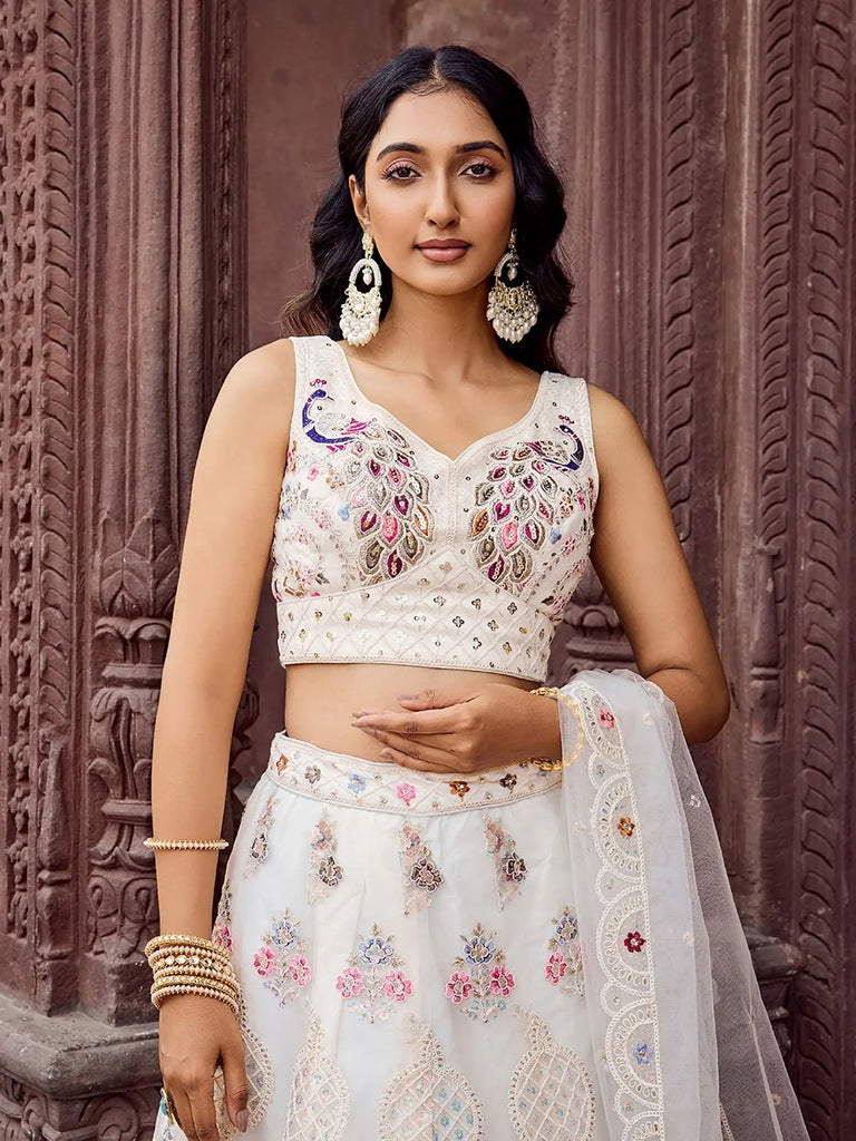 Stunning Cream Sequins Embroidered Net Wedding Wear Lehenga Choli