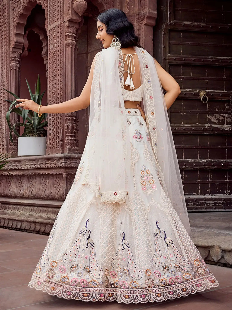 Stunning Cream Sequins Embroidered Net Wedding Wear Lehenga Choli